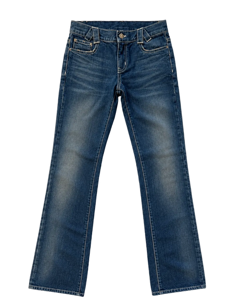 A pair of medium-wash blue denim jeans with a subtle fading effect.