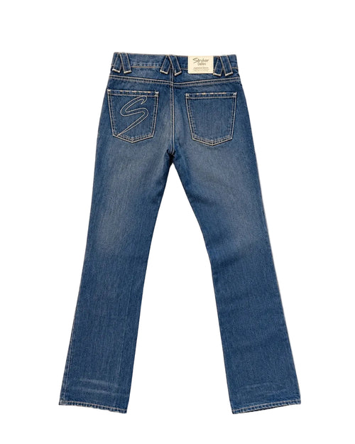 Back view of a pair of blue denim jeans, showing the back pockets with contrast stitching and a small white brand label at the waistband.